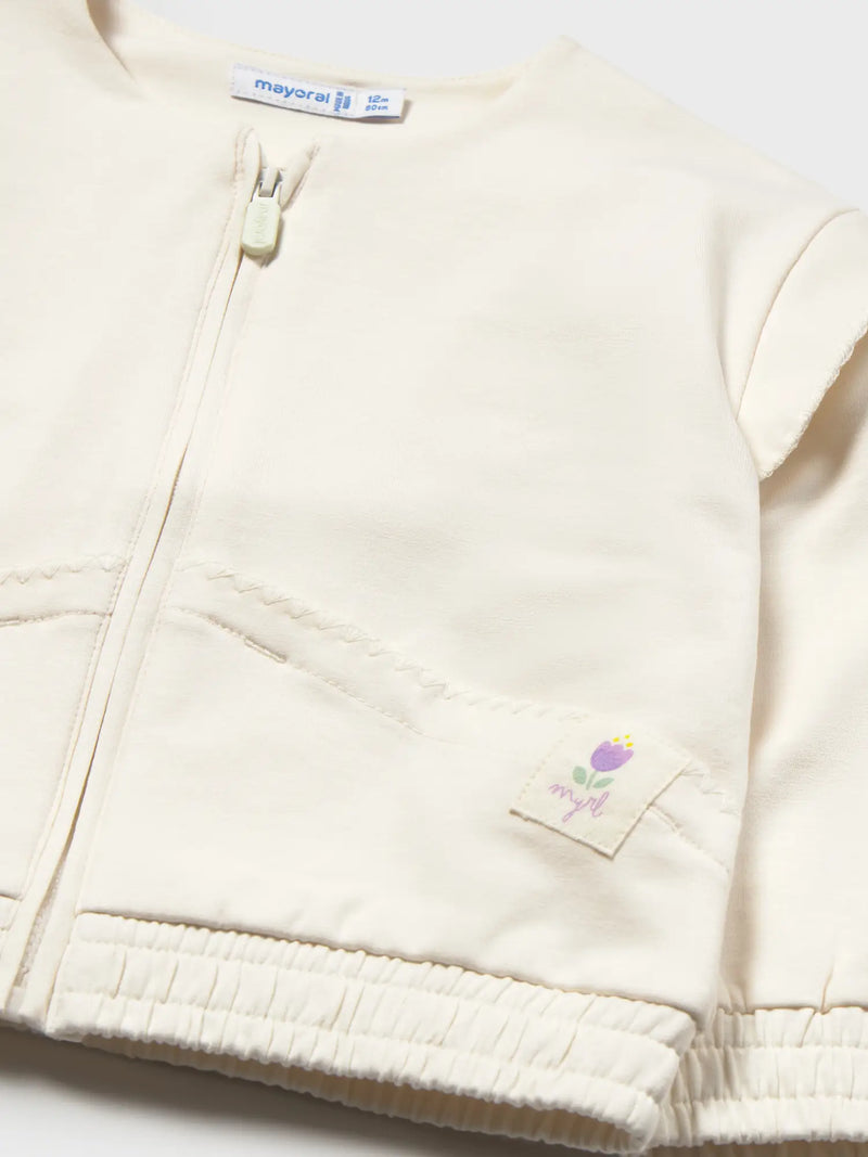 Closer look at the Mayoral embroidered jacket.