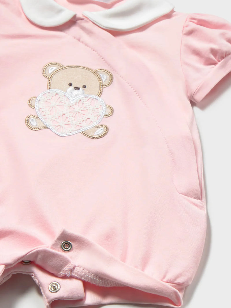 Closer view of the Mayoral pink romper.