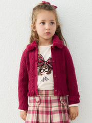 Girl wearing the Mayoral faux fur cardigan.