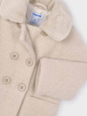 Closer look at the Mayoral button coat showing detail of the faux fur collar