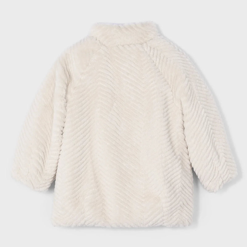 Rear view of the Mayoral beige faux fur coat.