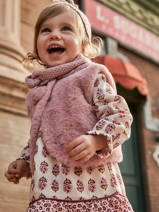 Baby girl wearing the Mayoral faux fur gilet.