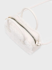 Closer view of the Mayoral faux fur handbag.