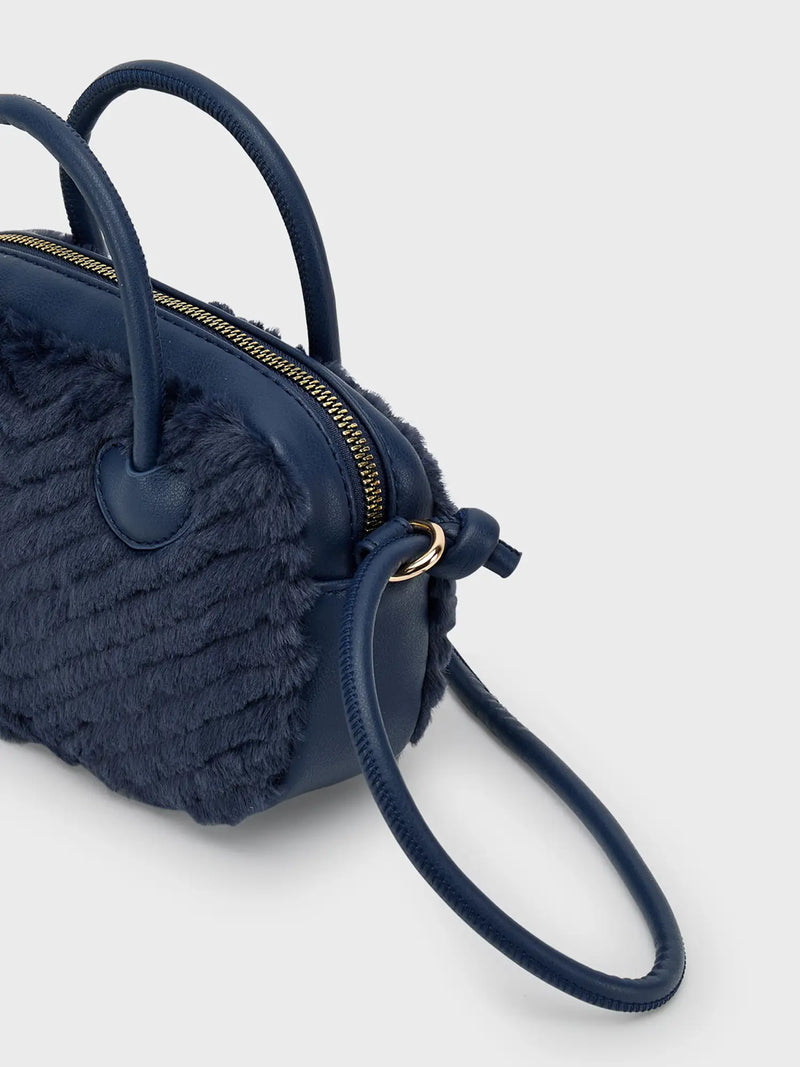 Rear view of the Mayoral faux fur handbag.