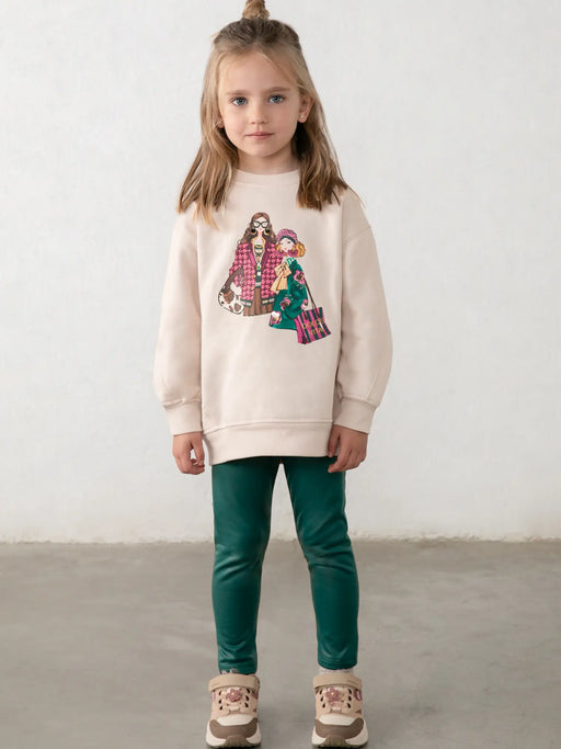Girl wearing the Mayoral faux leather leggings set.