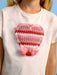 Mayoral white t-shirt with knitted heart on the chest.