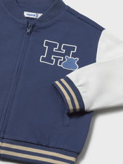 Closer look at the Mayoral baseball jacket showing detail of the cute hippo design.