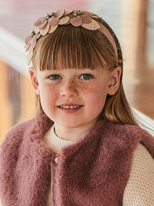 Girl modelling the Mayoral floral headband.