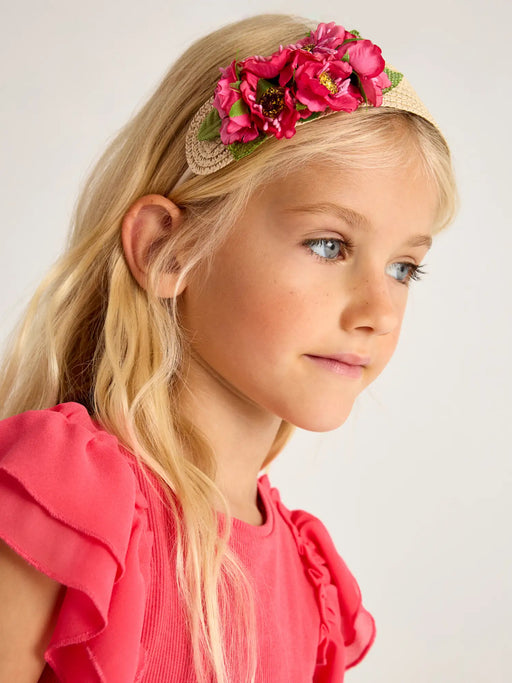 Girl wearing the Mayoral floral headband.