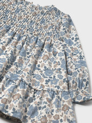 Mayoral smocked dress with gold logo badge on the chest.