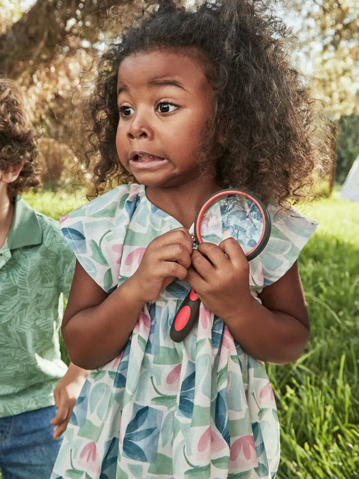 Girl wearing the Mayoral floral print dress.