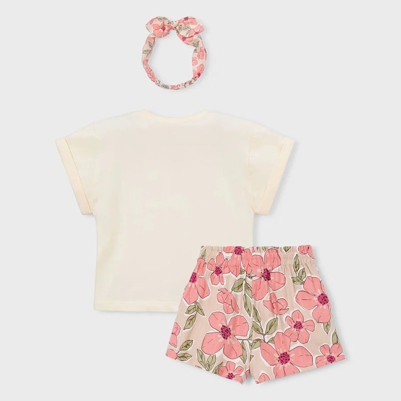 Rear view of the Mayoral floral print shorts set.