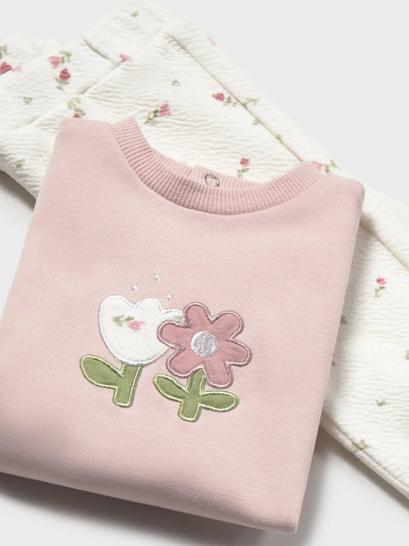 Closer view of the Mayoral floral print tracksuit.