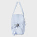 Side view of the Mayoral fringed maternity bag.