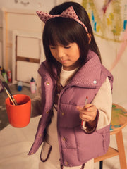 Girl modelling the Mayoral gilet.