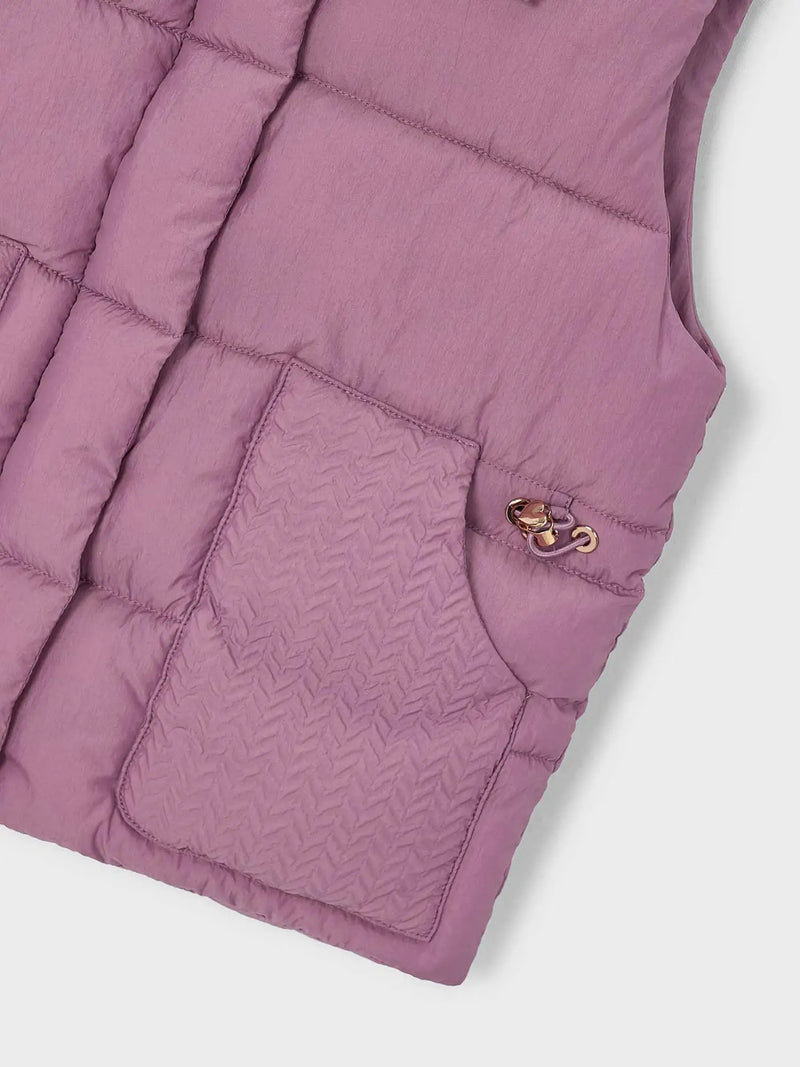 Closer look at the Mayoral gilet.
