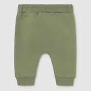 Baby boy's green track bottoms.