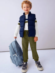 Boy modelling the Mayoral gilet set.
