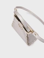 Closer look at the Mayoral handbag showing detail of the soft sheen finish.