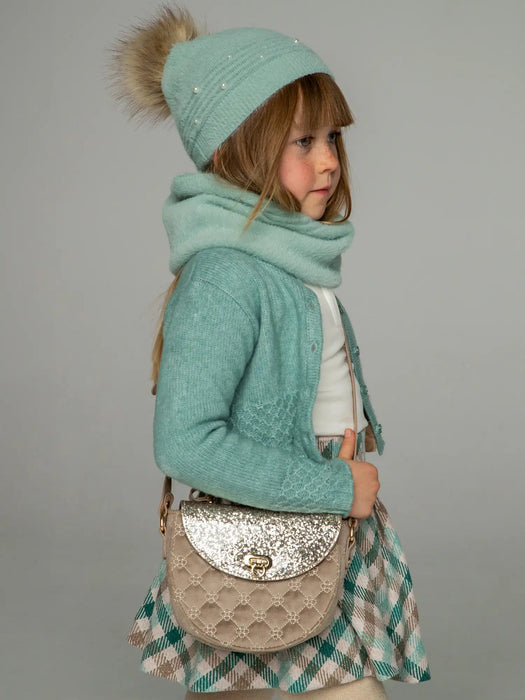 Girl modelling the Mayoral shoulder bag.