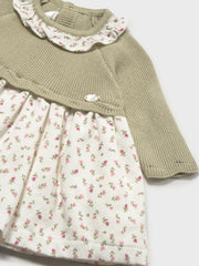 Mayoral knitted dress with floral print skirt.