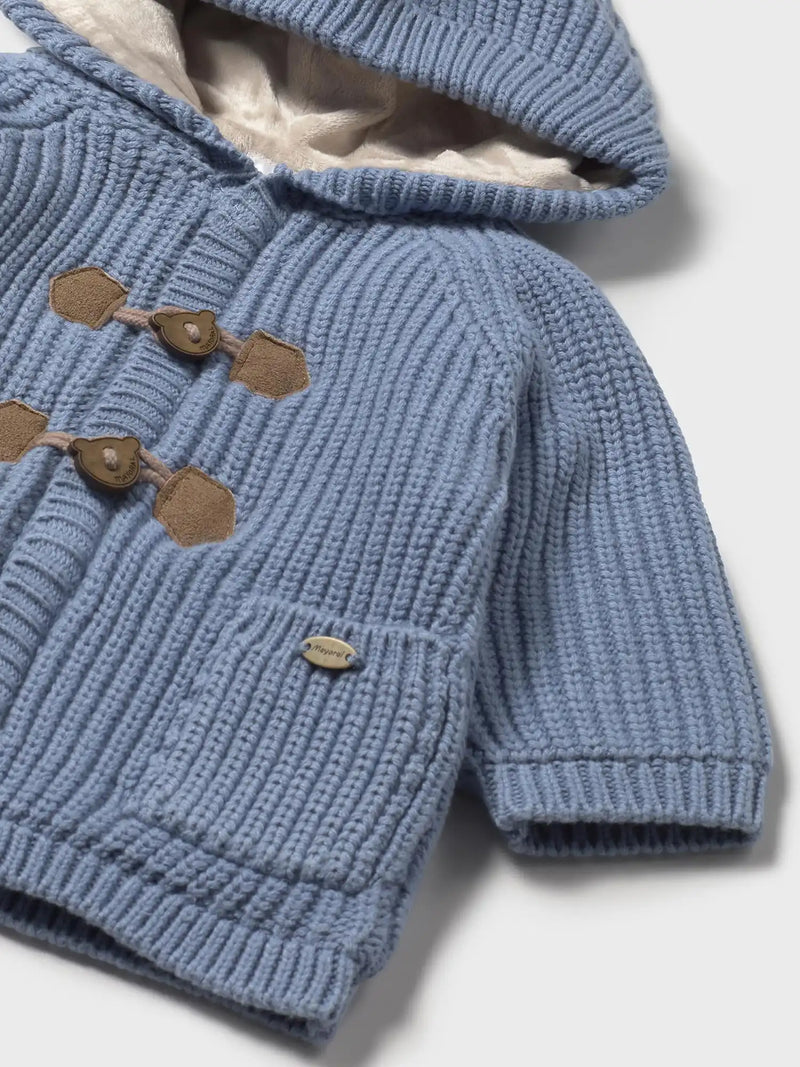 Closer look at the Mayoral rib knit jacket showing detail of the teddy bear toggles