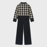 Rear view of the Mayoral houndstooth jumper set.