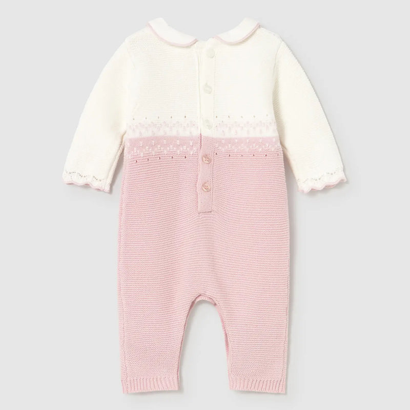 Rear view of the Mayoral pink knitted romper.