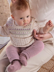 Baby girl modelling the Mayoral knitted set.