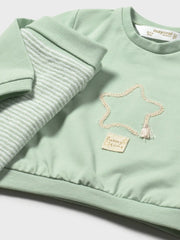 Closer view of the Mayoral leg warmer set.