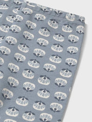 Closer view of the baby girl's floral print leggings.