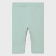 Baby girl's green leggings.