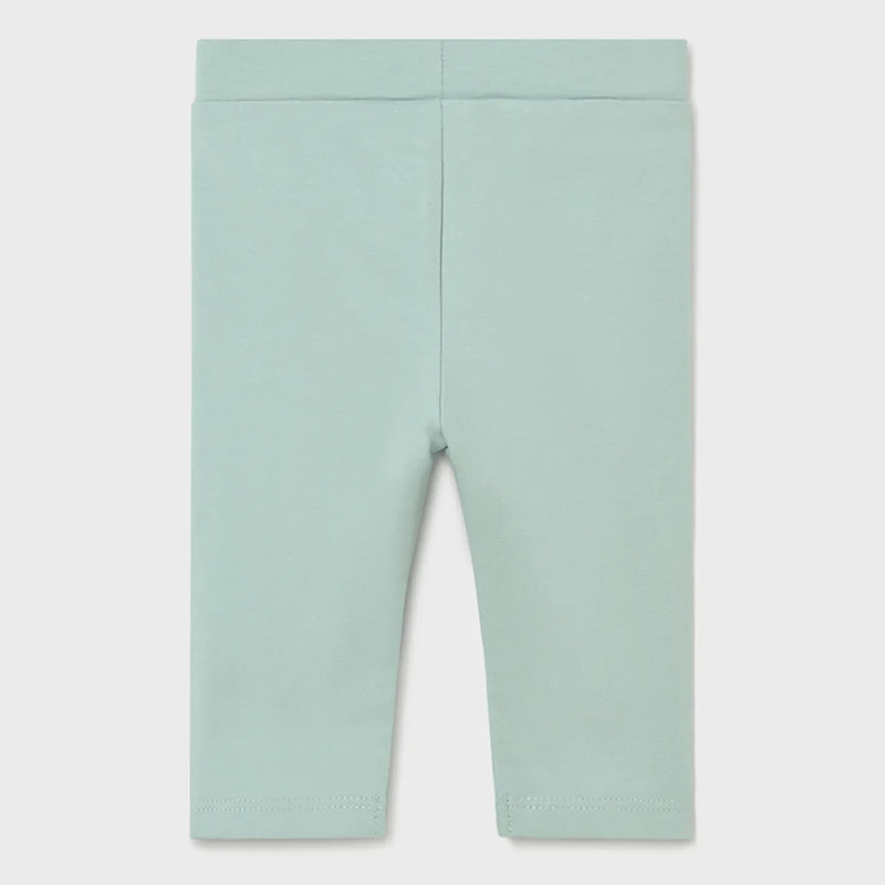 Baby girl's green leggings.