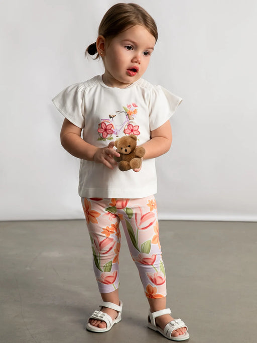 Baby girl wearing the Mayoral leggings set.