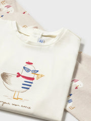 Closer view of the Mayoral bird print leggings set.