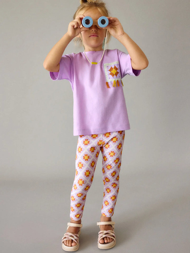 Girl modelling the Mayoral leggings set.