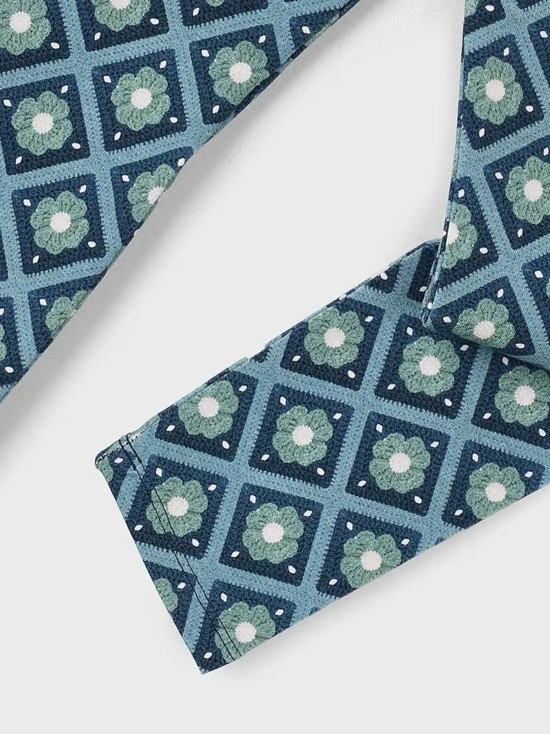 Green Mayoral leggings with tiled pattern.