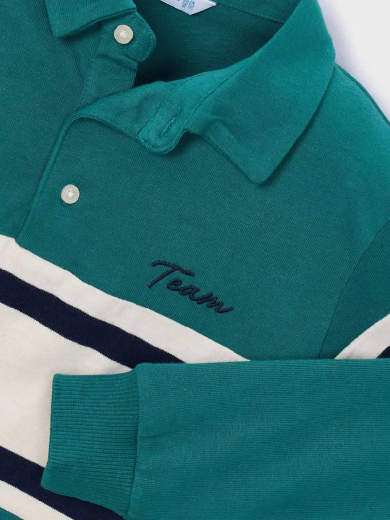 Closer look at the Mayoral long sleeve colourblock polo shirt showing detail of the script logo embroidery.