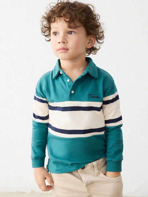 Boy wearing the Mayoral long sleeve colourblock polo shirt.