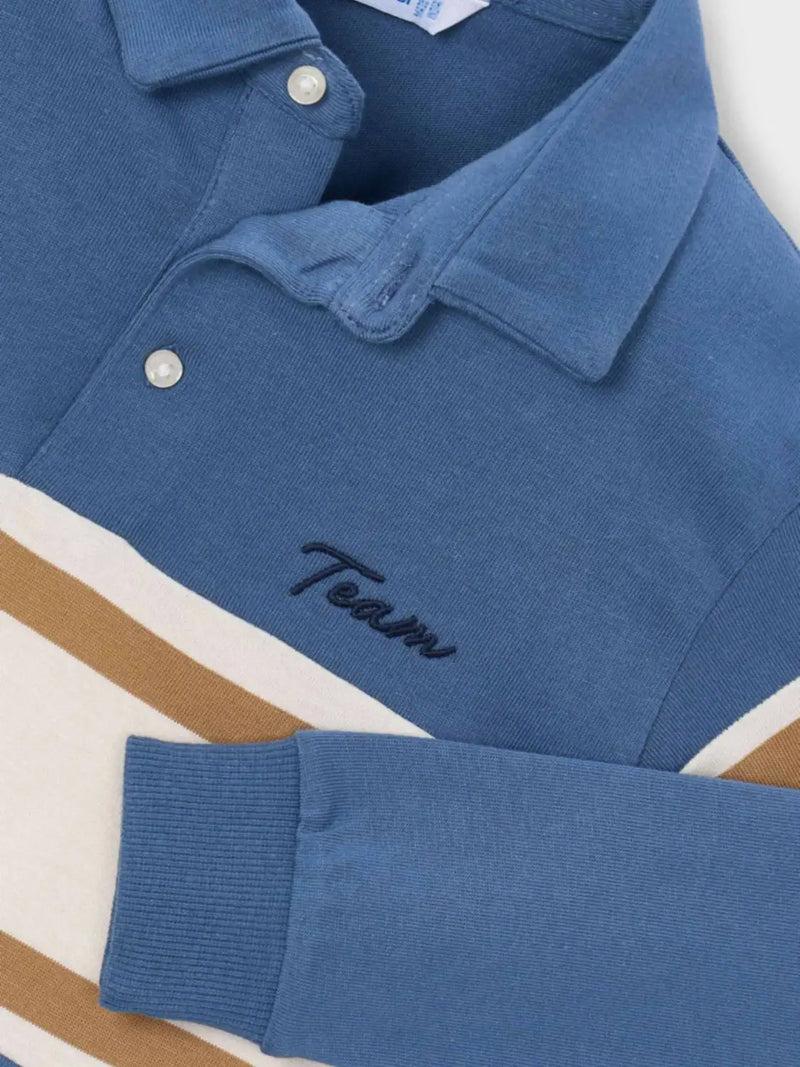 Closer look at the Mayoral long sleeve colourblock polo shirt showing detail of the script logo embroidery.