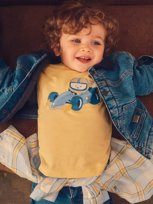Baby boy wearing the Mayoral long sleeve race car t-shirt.