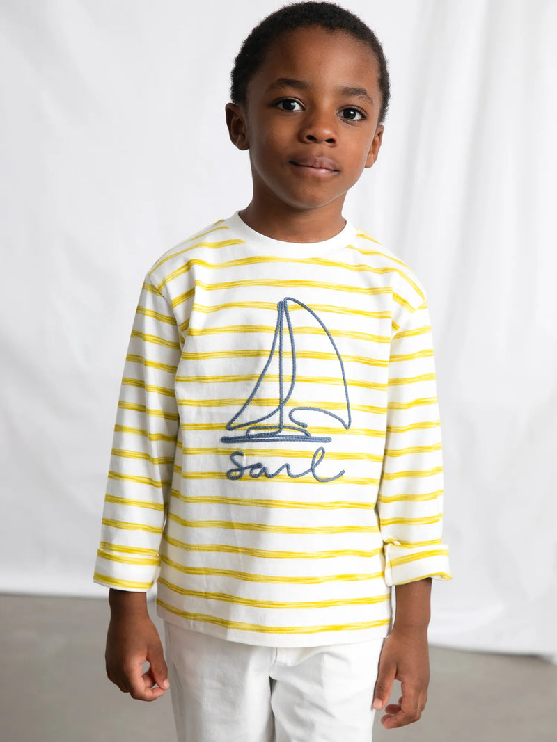 Boy wearing the Mayoral long sleeve striped t-shirt.