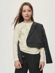 Girl wearing the Mayoral long sleeve t-shirt.