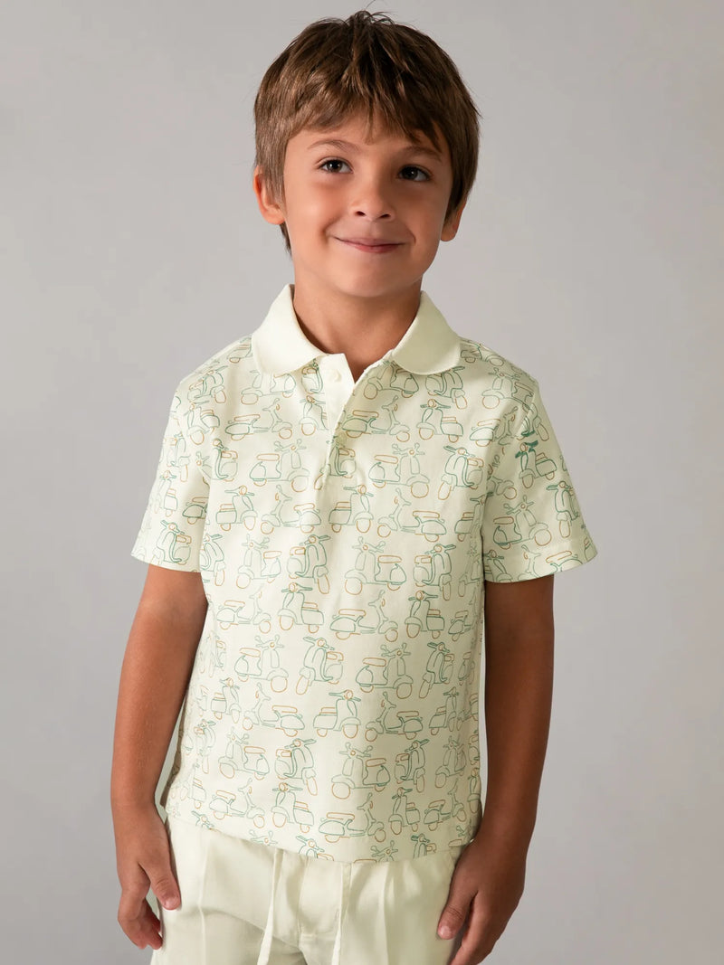 Boy wearing the Mayoral moped polo shirt.