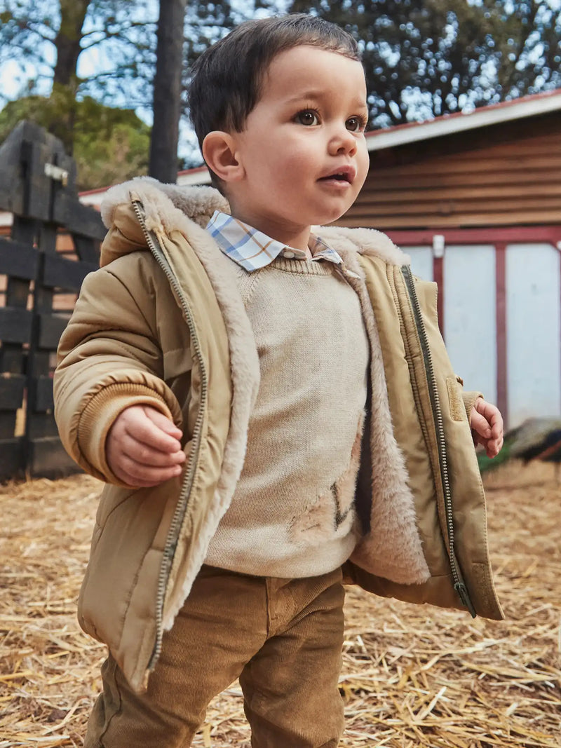 Boy wearing the Mayoral baby boy's padded jacket.