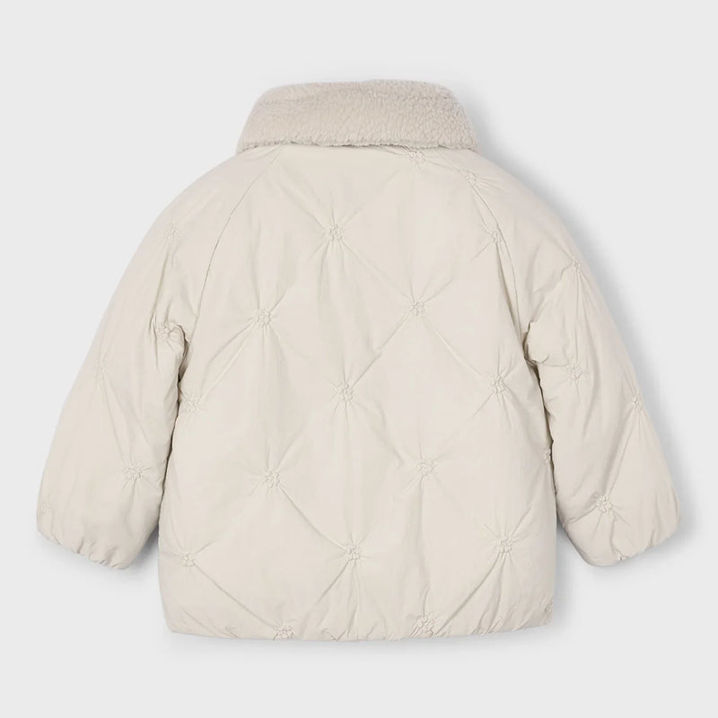 Back of the Mayoral beige padded jacket.