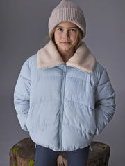 Girl wearing the Mayoral padded jacket.