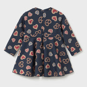 Rear view of the Mayoral baby girl's pastry print dress.