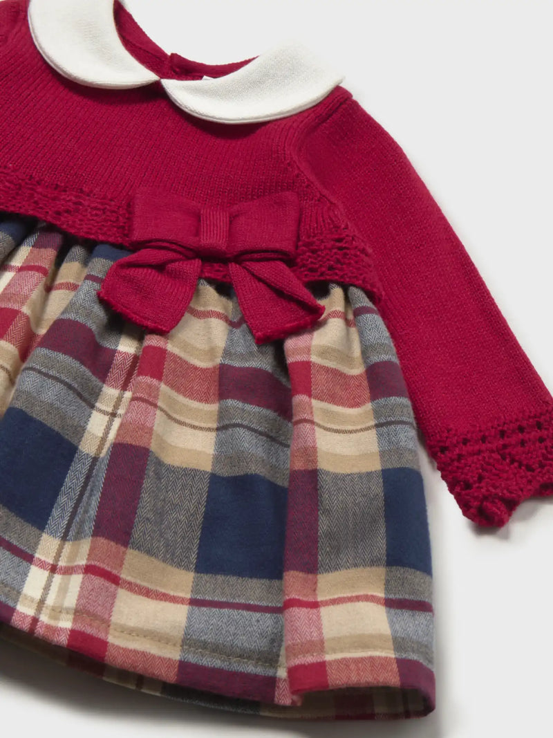 Closer look at the Mayoral plaid dress showing detail of the openwork detailing.