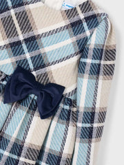 Mayoral plaid dress with navy bow at the waist.